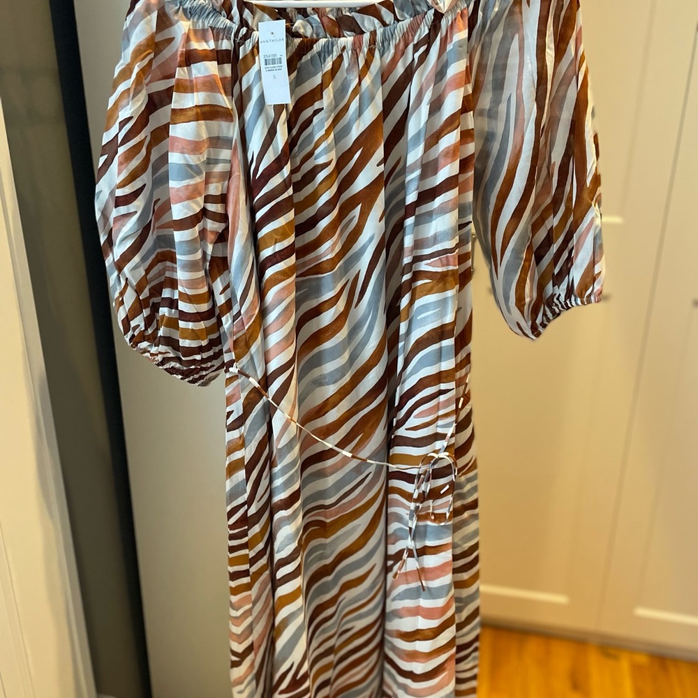 Lovely animal print maxi dress. Runs large but will be perfect poolside…